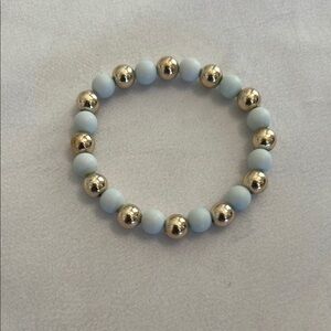 Gold and White Beaded Bracelet with Elastic Design